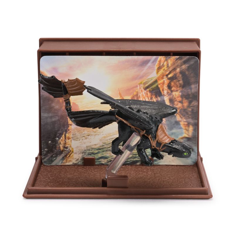 Jak vycvičit draka figurka s kartami v knize draků