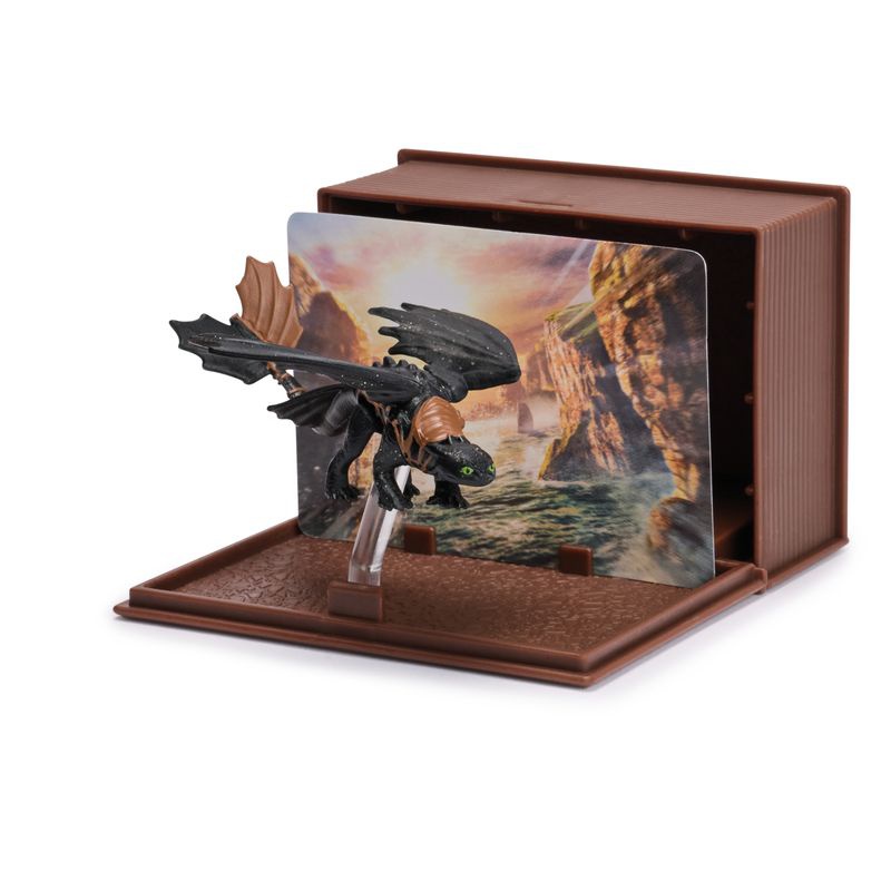 Jak vycvičit draka figurka s kartami v knize draků